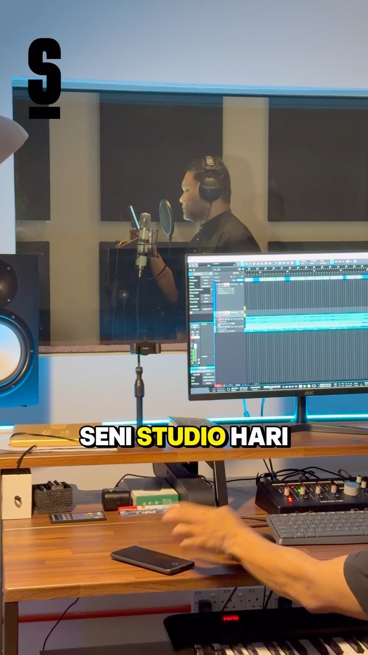 Record / create — Vocal recording session with studio monitor.